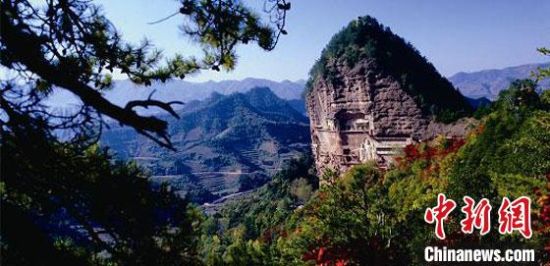 圖為世界文化遺產(chǎn)麥積山石窟。(資料圖)甘肅省文物局供圖